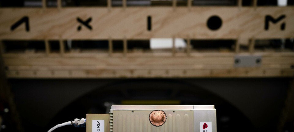 Axiom Space’s Data Center Unit-1 (AxDCU-1) on a bench with AXIOM in the background