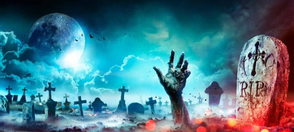 Hand reaching up from the grave