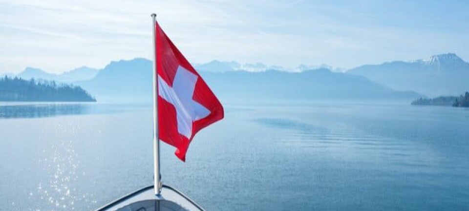 Swiss flag flying on boat