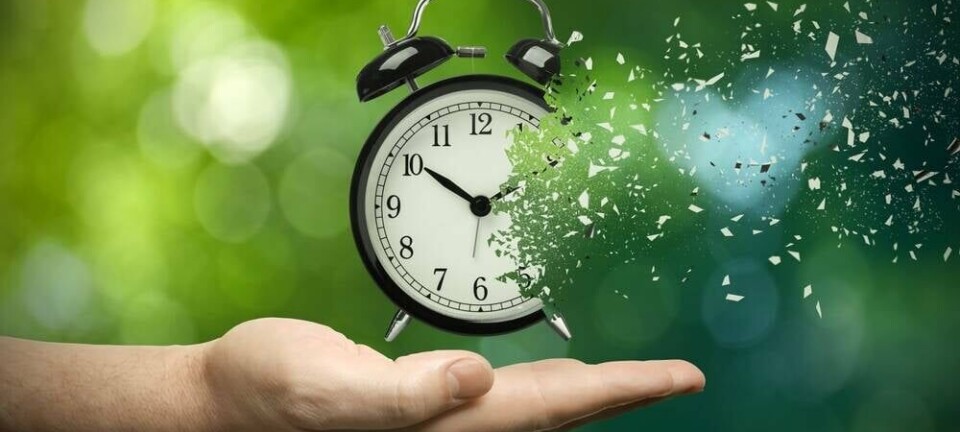Someone holding a shattering clock
