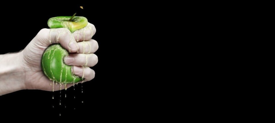 squeezing an apple