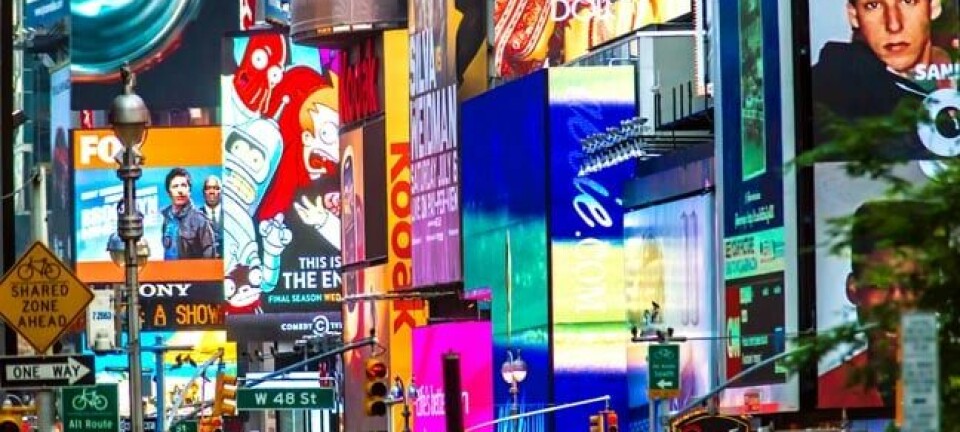 Ads on Times Square. Photo by Allen G via Shutterstock editorial use only