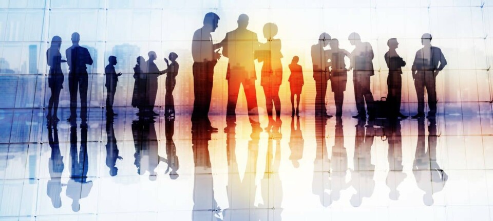 Colorful silhouettes of office workers in a corporate environment