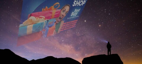 Illustration of someone looking at an ad projected from space