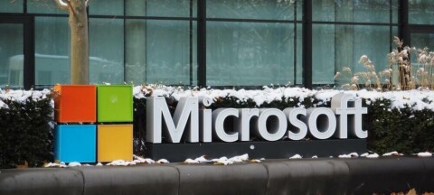 The Microsoft logo with some snow on it