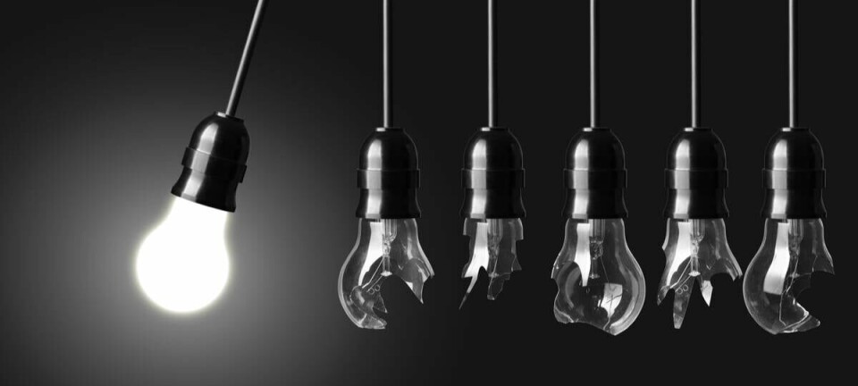 A would-be Newton's cradle that uses smashed lightbulbs - illustration of a poorly executed idea