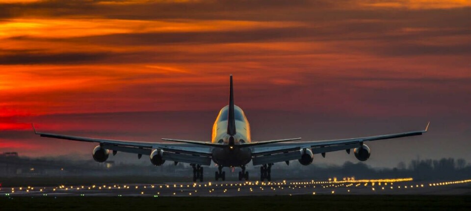 plane lands at london heathrow airport