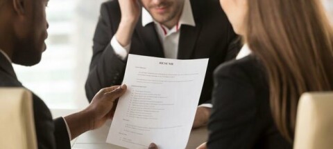 A man looks nervous at an interview