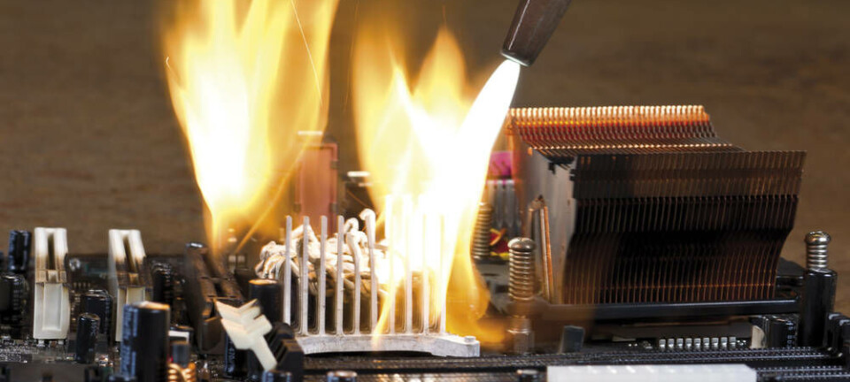A blowtorch burning a computer board