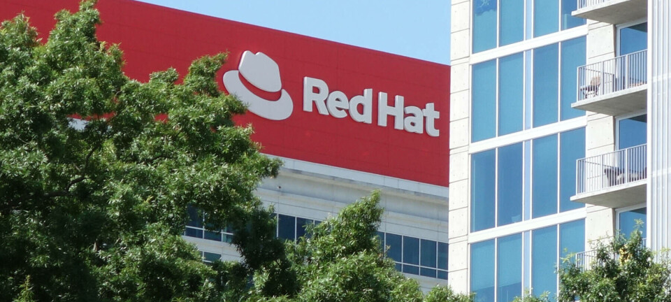 The Red Hat logo on a building in the USA