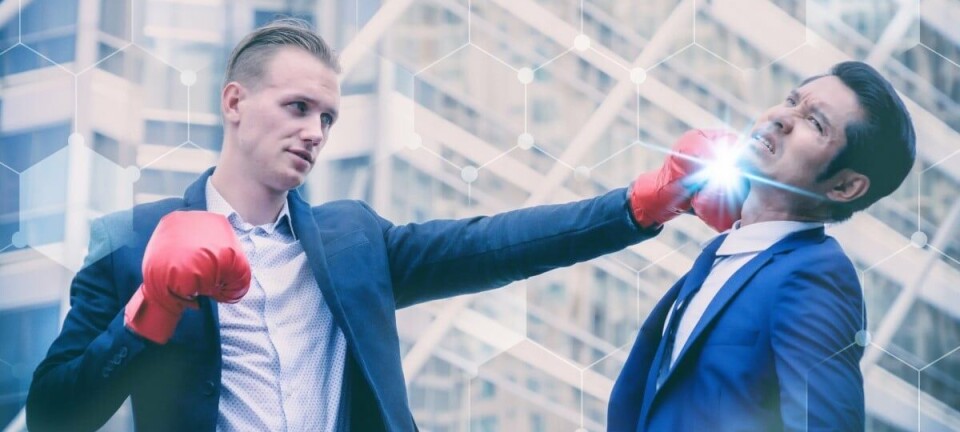 Men in suits boxing