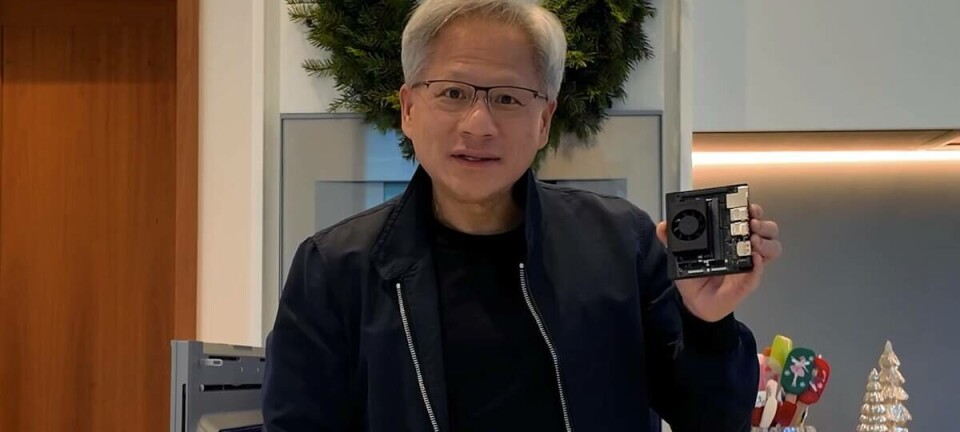 Jensen Huang holds up Nvidia's new Jetson Orin Nano Super dev kit.
