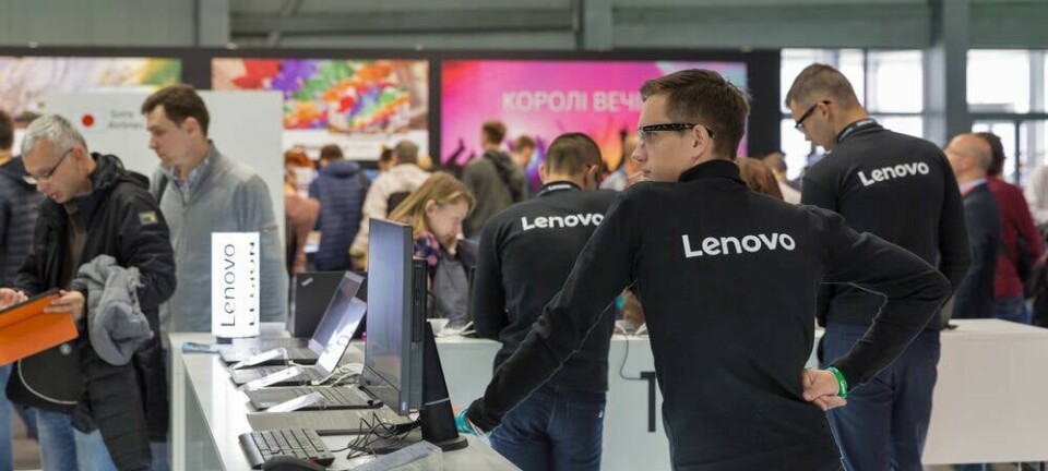 People visit Lenovo, a Chinese multinational technology company booth during CEE 2017, the largest electronics trade show of Ukraine