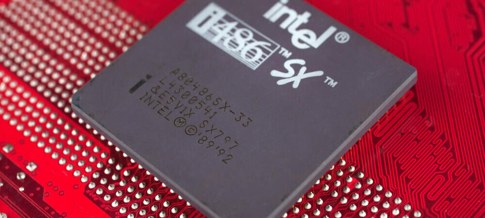 An Intel 486 (80486) SX processor on a red motherboard