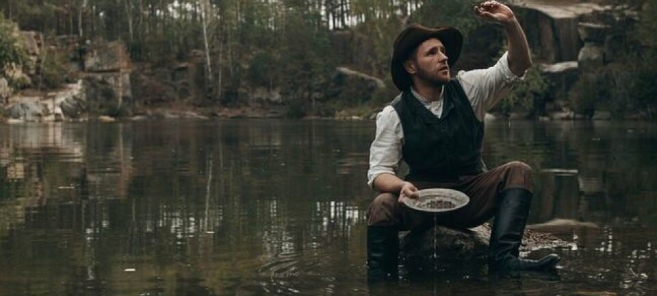 Gold prospector in river