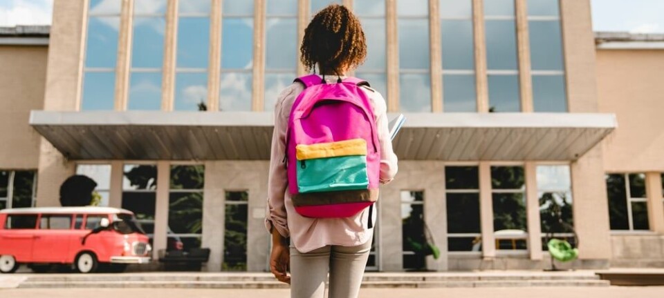 schoolkid with backpack /satchel
