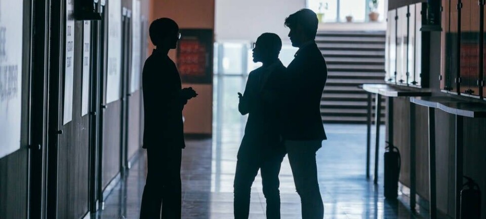 coworkers in the hallway