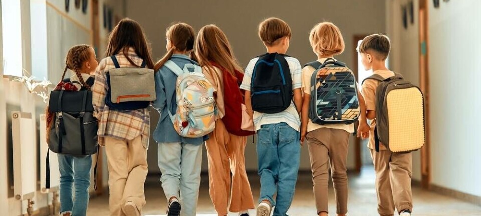 Generic shot of some kids walking down a corridor at school