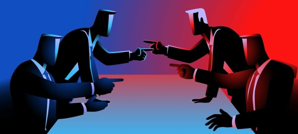 Men in suits on opposite side of a table angrily pointing at each other
