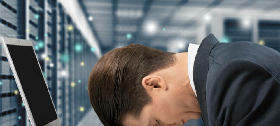 stressed exec in server room. pic shutterstock