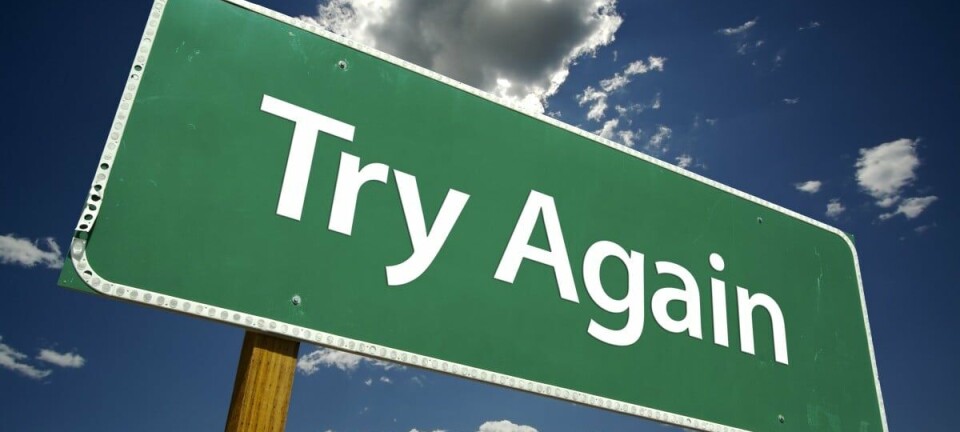 'Try Again' road sign