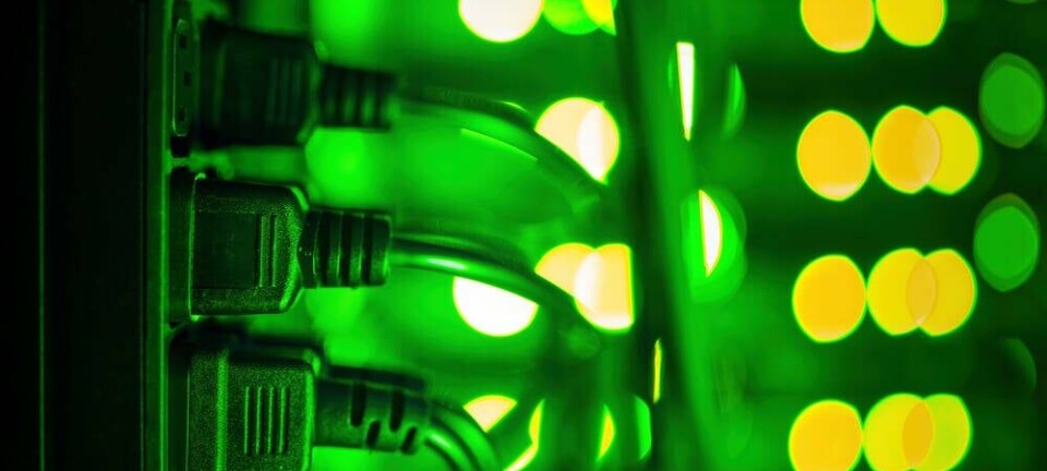 Close up of datacenter equipment illuminated by lots of green light