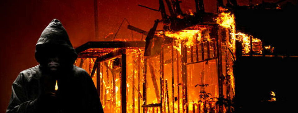 arsonist in front of burning building