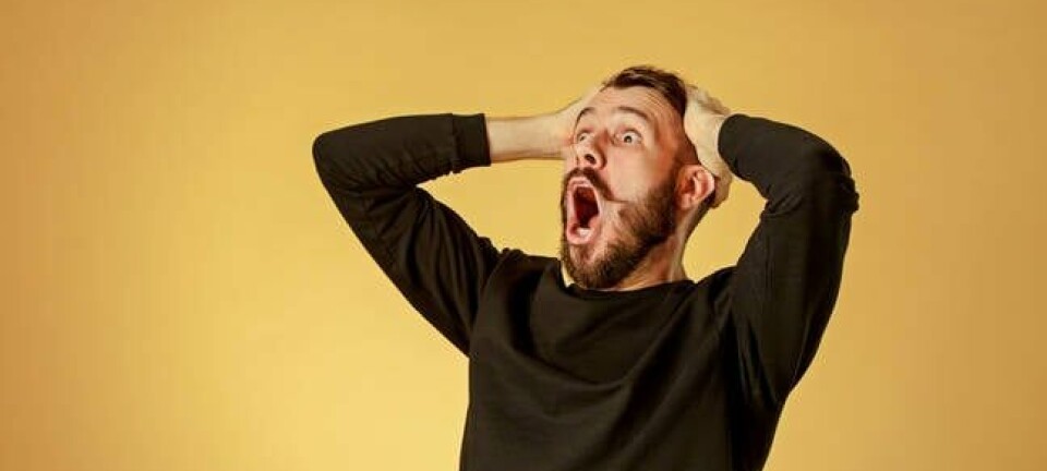 man yells in shock