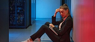 Someone looking depressed in a datacenter