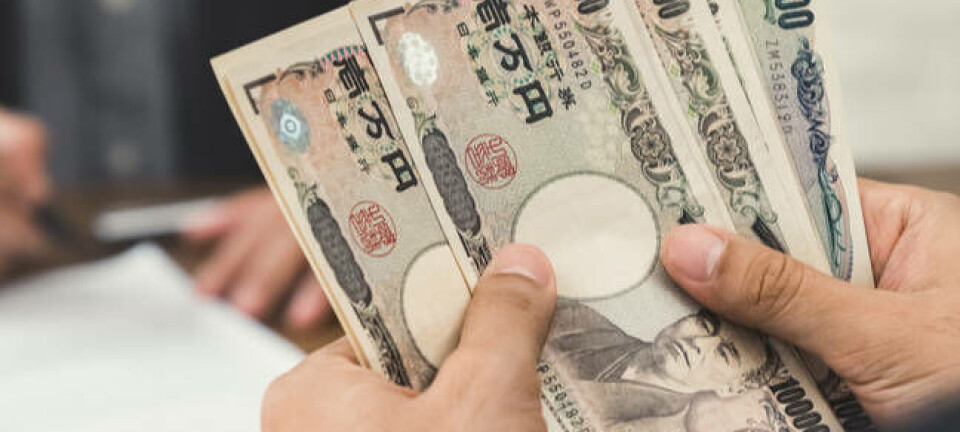 Japanese yen banknotes money after signing loan contract