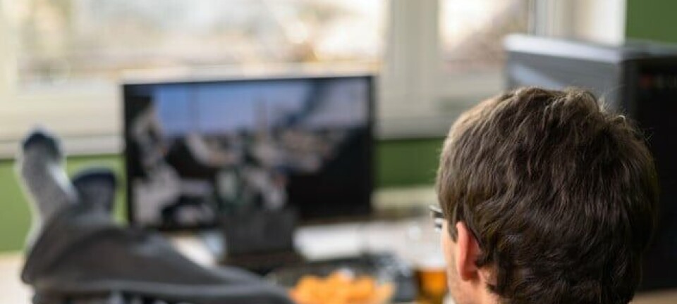 man watches video on his desktop