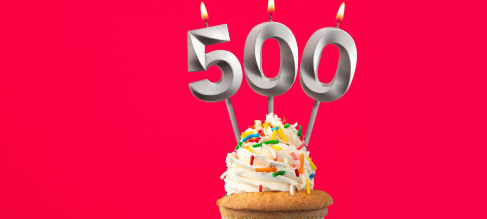 Illustration of a celebration cake with 500 on it on candles