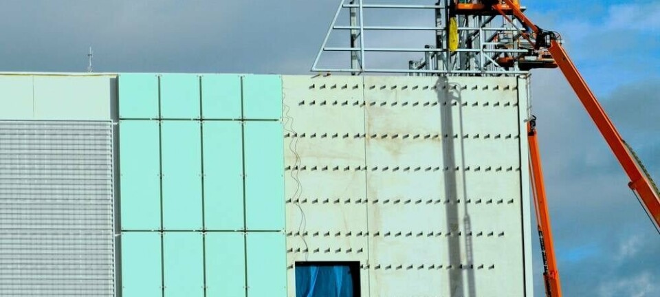 Construction crew working on a boom lift during the erection of a new internet data center building at Continuum business park in Arizona, 2023