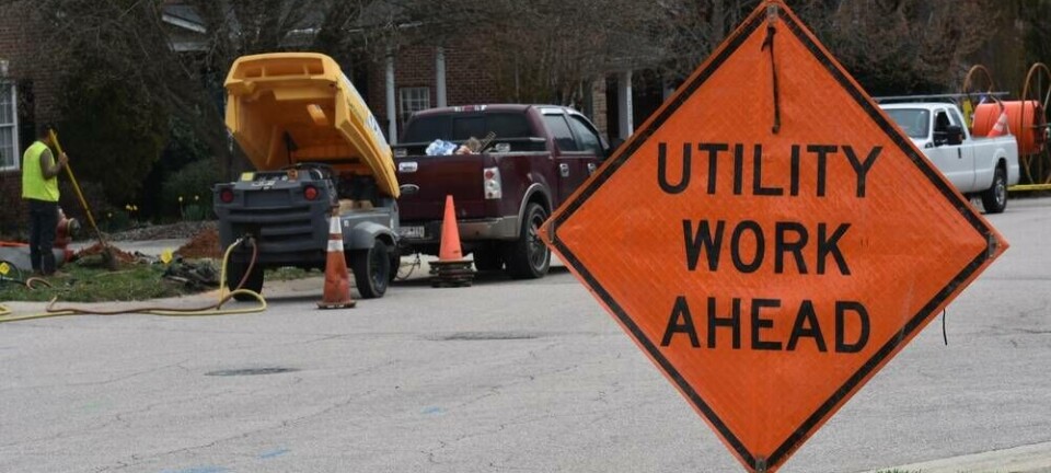 Contractors working on behalf of Google Fiber begin laying cable in a residential area. Pic credit: Sharkshock / Sutterstock