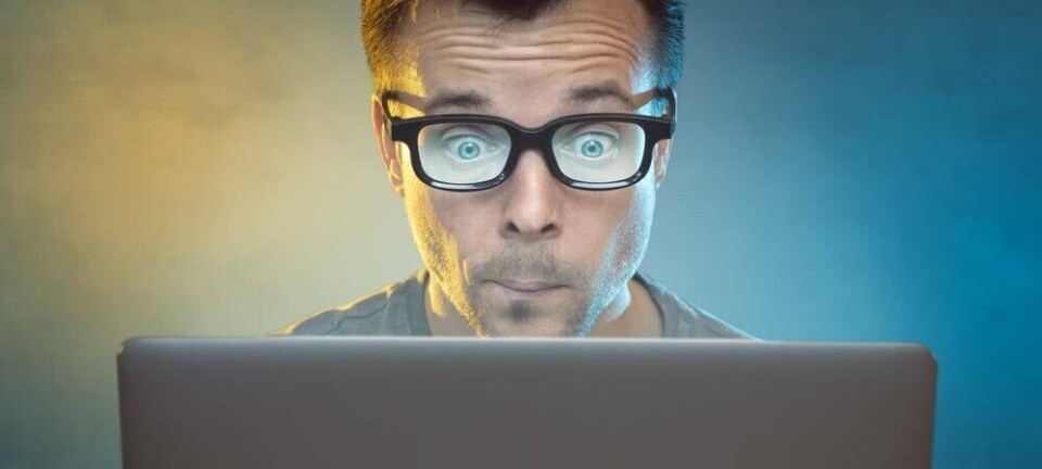 Man in front of a laptop computer. Pic: photoschmidt / shutterstock