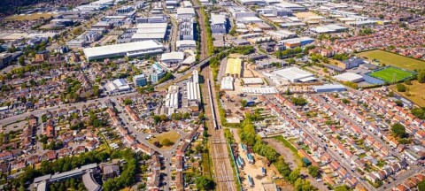 Drone image of Slough Trading Estate, one of Europe’s largest industrial business parks, with warehouses, factories, and nearby residential zones—perfect for industry, logistics, and economy topics. pic: Alexey Fedorenko / Shutterstock