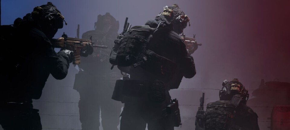 Three armed officers in tactical gear move through smoke in a dimly lit training scene.